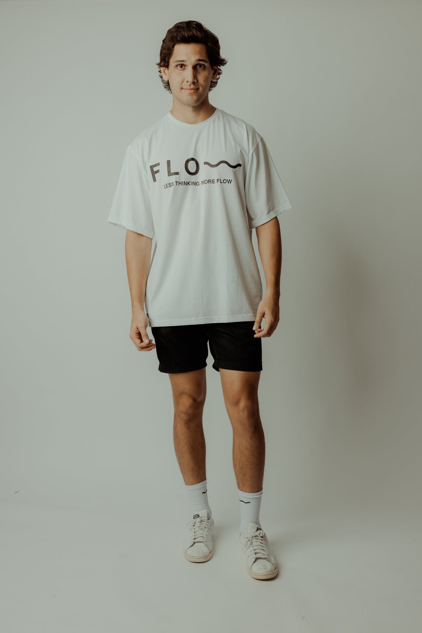 LESS THINKING MORE FLOW TEE WHITE